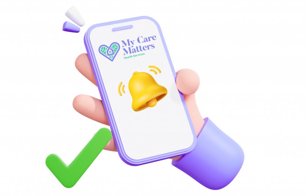 Senior receiving a phone alarm reminder for medications from a My Care Matters caregiver in Vancouver, BC, promoting safe and timely medication management.