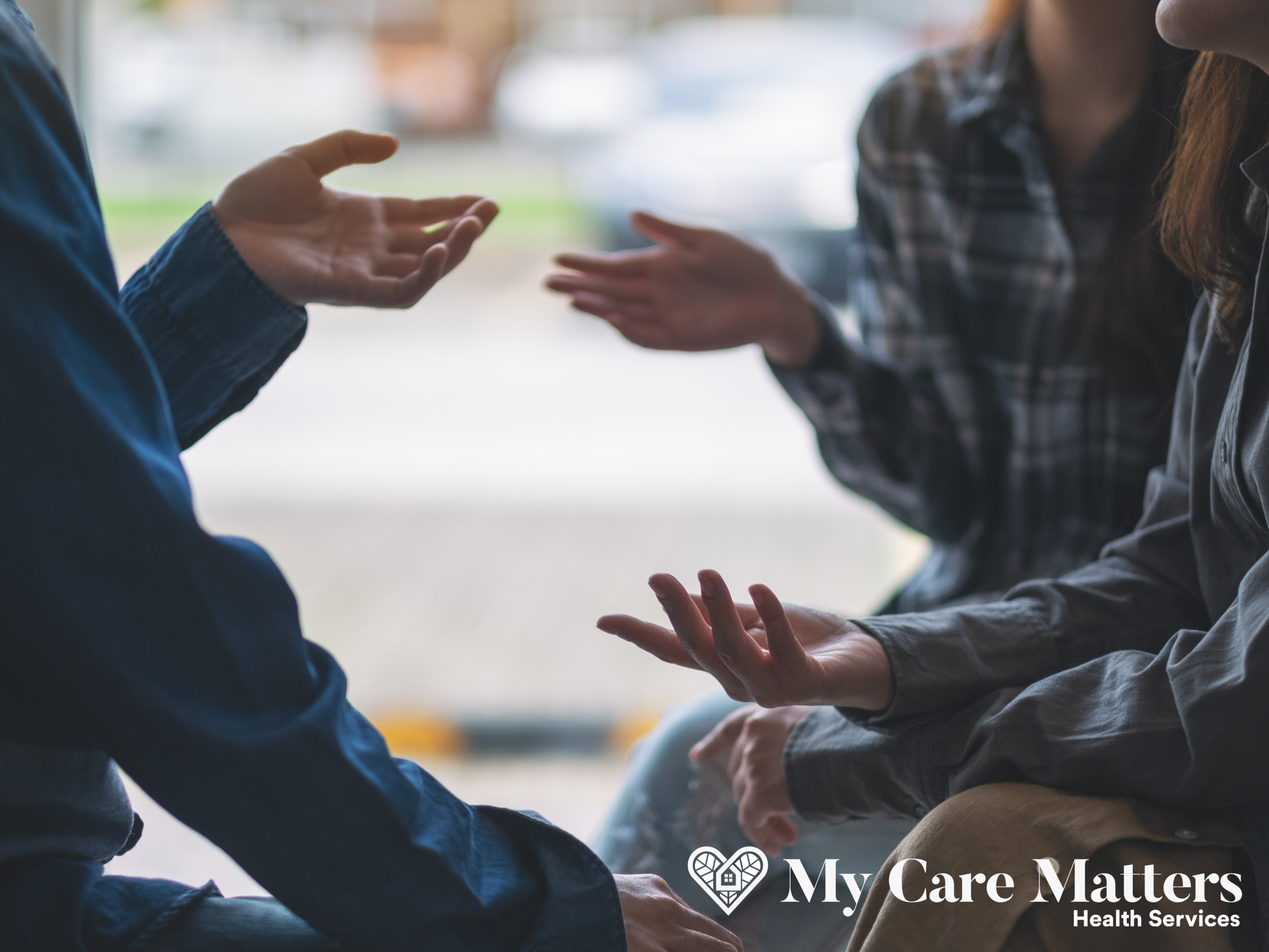 Caregiver engaging in calm, empathetic conversation with a senior client in Vancouver to build trust